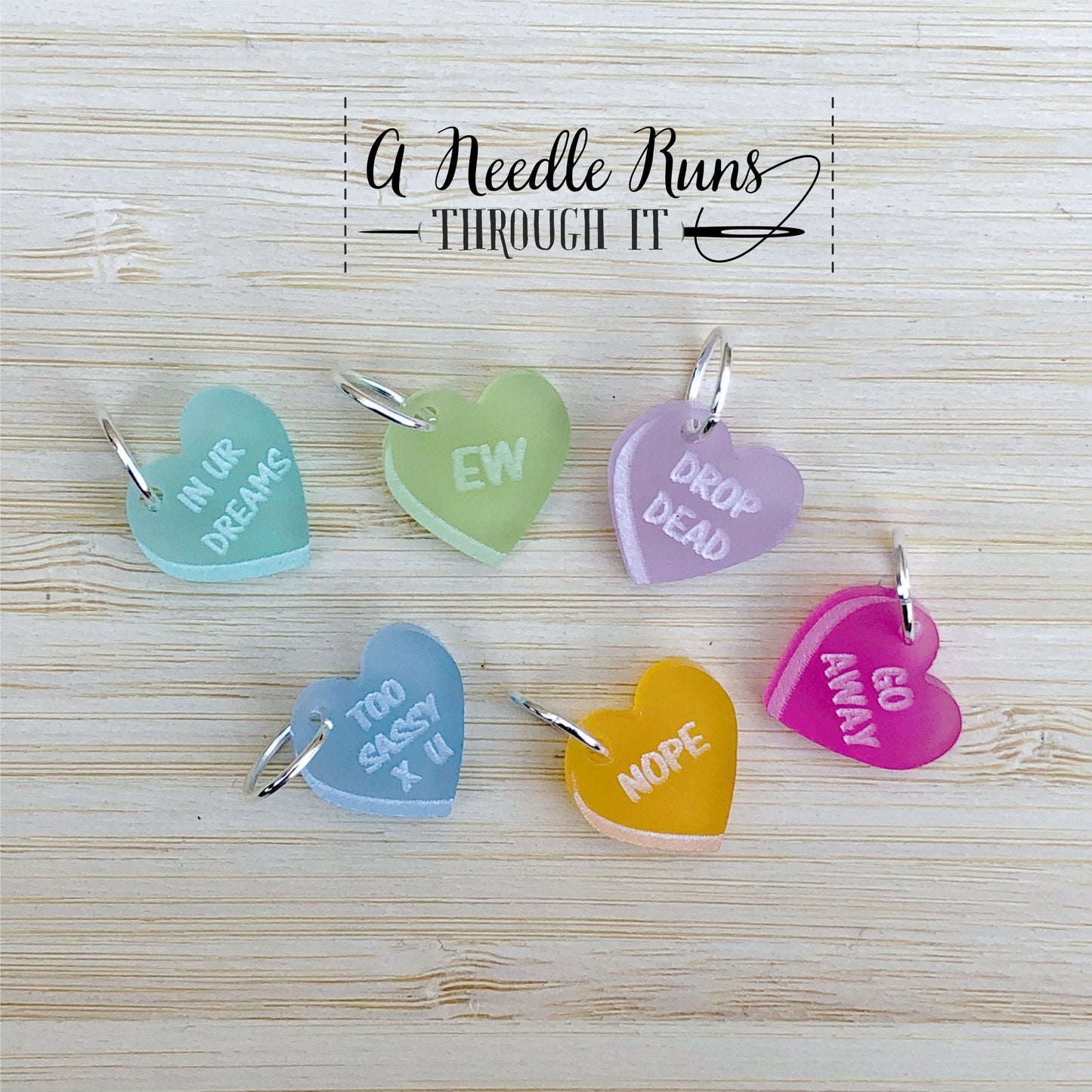 Sassy valentine stitch markers for knitting or crochet. Progress keepers Valentine’s Day. Candy heart stitch markers. Color Stitch markers